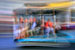 Colorful and blurry image of people on San Francisco Street Car