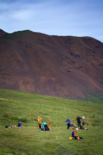 Photographers aren’t the only ones who relish the natural beauty of the Denali landscape and light. A group of plein air painters have their easels and canvases set up to interpret Denali in their own way. 