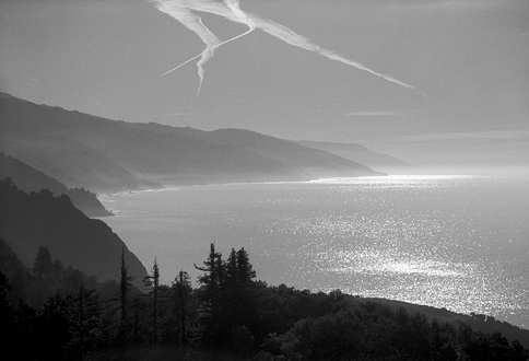 Looking south from the deck of the Nepenthe Café, the wintery cold upper atmosphere held the contrails long enough for them to accumulate over a few minutes. And check out the condor just over the trees in the foreground. When I’m shooting I’m often thinking, “I can’t believe I’m capturing this.” It’s as if I’m getting away with something. 