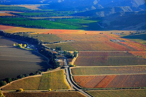 500-1,000 feet above the autumn-colored vineyards of the River Road Wine Trail. Includes Talbott Sleepy Hollow, Estancia Stonewall, Lucia Highlands, and Pessagno Four Boys vineyards with the Salinas Valley, River Road, and the Santa Lucia Mountains. 