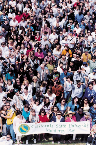 During the first few years of the university, it was tradition to rally everyone on campus (students, faculty, staff, and visitors) in the middle of the quad and take a group photo from one of the rooftops. This is a cropped version of one of those photos so the people overflow the frame. 