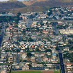 Aerial photo of small coastal city.