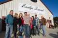 4 couples pose outside the Marilyn Remark winery.