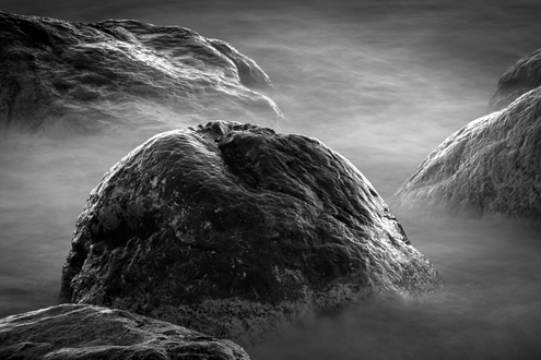 This photograph was accepted into the 2014 Center for Photographic Juried Portfolio Exhibit, and recognized by the International B&W Spider Awards. Part of a black and white portfolio of landscape and abstract nature photographs depicting Science Fiction-like imagery from distant galaxies to Earth’s prehistoric natural history. 
