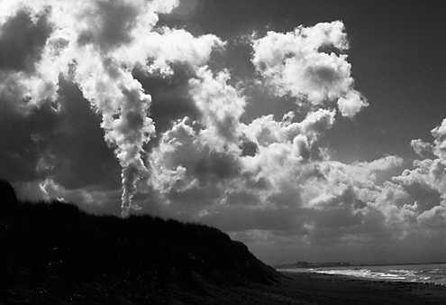 The steam from the Moss landing power plant blended seemlessly with the clouds of a clearing storm over the Monterey Bay. 