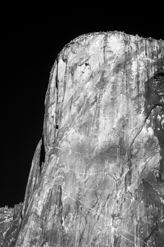Looking at El Capitan through the invisible infrared spectrum accentuates the scars and wrinkles of an ancient rock face older than the human species. 