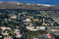 View from the air of a college campus near the ocean.