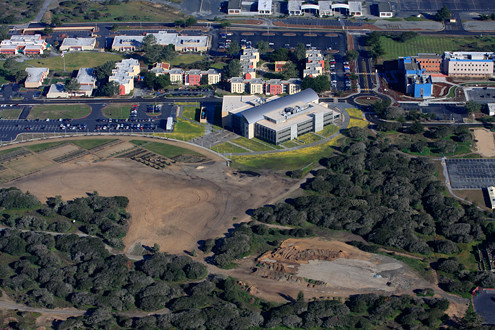 Aerial view of CSUMB’s Tanimura & Antle Memorial Library, Chapman Science Center, residence halls, and Quad. 