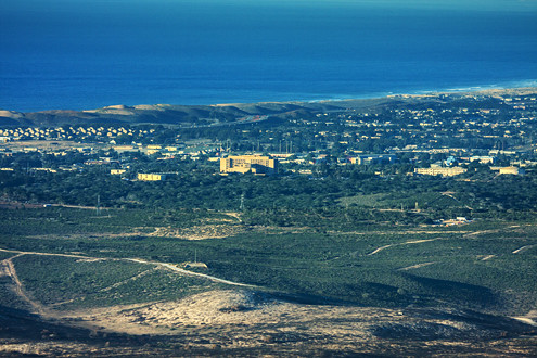 Aerial view of the Fort Ord National Monument looking northwest out to the former Fort Ord, Cal State Monterey Bay, the City of Marina, and Monterey Bay National Marine Sanctuary. 