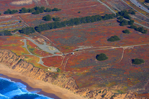Aerial view Fort Ord Dunes State Park’s old cement bunkers and watch tower. 
