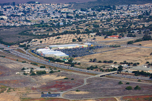 Aerial view of Fort Ord Dunes State Park’s northern boundary including Highway 1, The Dunes Shopping Center, and greater Marina. 