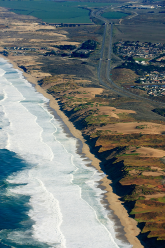 Aerial view of Marina State Beach and Highway 1 along the Monterey Bay. 