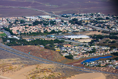 Aerial view of the City of Marina’s northern area including Locke-Paddon Park, vernal ponds, Armstrong Ranch, and Marina Landing Shopping Center. 