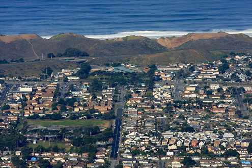 Aerial view of the City of Marina including Carmel Avenue, Marina State Beach, and the Monterey Bay. 