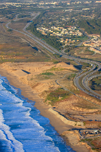 Aerial view of Sand City’s beach area, Highway 1, and Seaside Highlands housing. 
