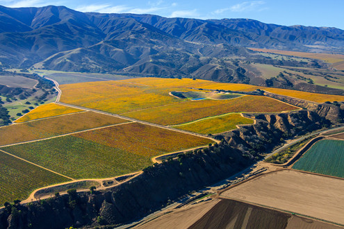 Flying between 200-1,500 feet above the famous Santa Lucia Highlands AVA in Monterey County’s Salinas Valley, this aerial photo includes Pinot Noir and Chardonnay vineyards of J. Lohr Costa and Hahn Doctor’s, and includes Foothill Road. 