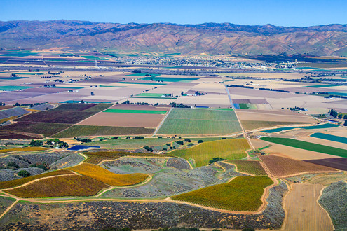 Flying between 200-1,500 feet above the famous Arroyo Seco AVA in Monterey County, this aerial photo includes the vineyards of Panorama, Clark, Ventana, and Zabala with the Gabilan Mountains in the background. 