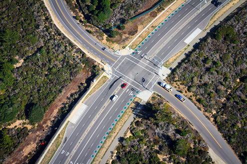 Aerial photo of Imjin Parkway at the Imjin Road Intersection on the former Fort Ord. Note the green bike lanes. 