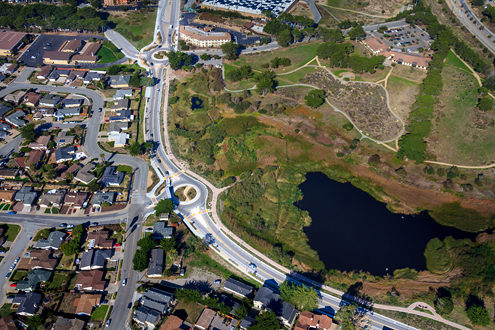 Aerial photo of the 2 Reservation Road roundabouts, Seaside Avenue and Seaside Court, and Robinson Drive adjacent to Locke-Paddon Park and its pedestrian/bike path. 