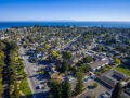 Drone photo of a West Santa Cruz neighborhood looking out over the Monterey Bay.