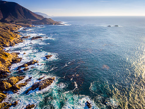 The Garrapata Big Sur coastline and mountains looking south just outside the NOAA National Marine Sanctuary no-fly zone boundary. 