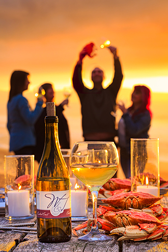 Nothing says wine and travel along the California Central Coast like Chardonnay and Dungeness crab at the beach at sunset. 