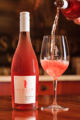 Product photo of a Scheid Rosé in their Carmel tasting room for marketing.