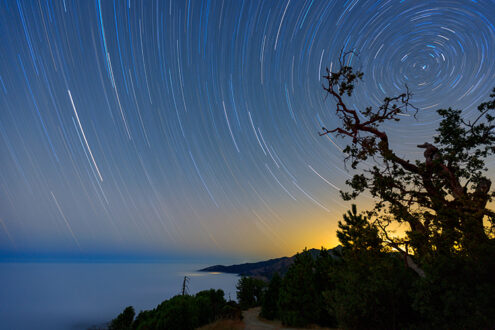 A star gate opens over the Big Sur coast on a summer night. Who is coming through? Z Photo Game Card No. 196 