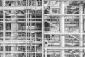 Black and white aerial photo of the insides of a power plant built in 1950.